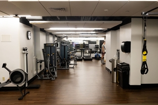 gym with many different types of workout equipment